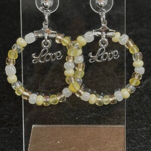 Elegant Buttercream Colored Beaded Hoop Earrings with Love Charm